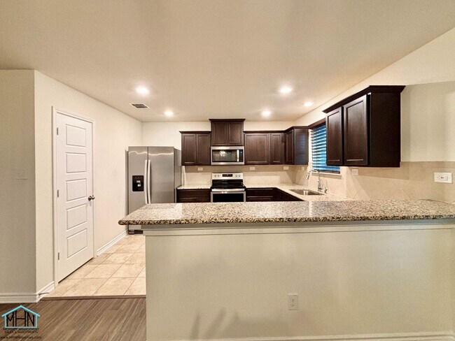 Building Photo - Welcome and Discover this thoughtfully des...