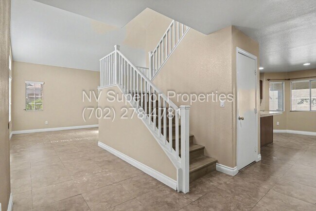 Building Photo - NW!! 4 bedrooms!! Bed & Bath DownStairs!!! RV Parking!!! Synthetic Grass Front yard!! Real Grass ...