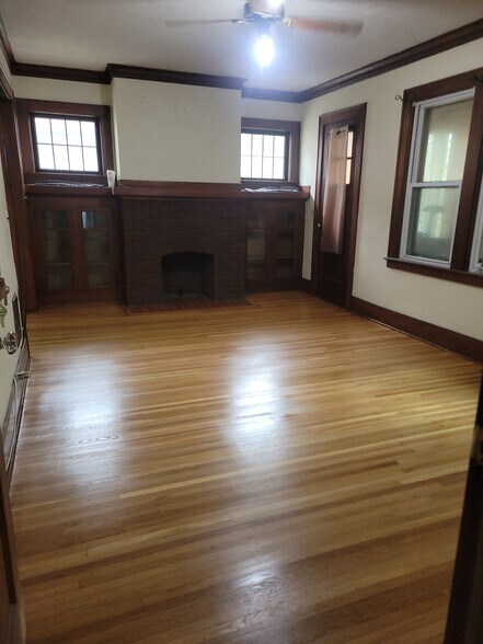 Living room, all hardwood floors have just been sanded an polished - 469 Maplewood Ave