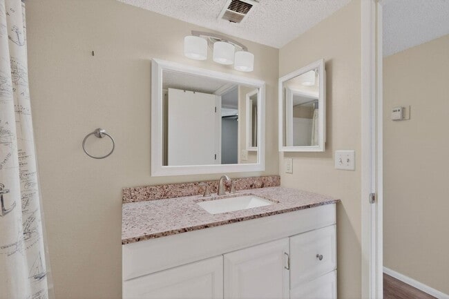 Building Photo - NE Affordable 2/BD 1/BA 1/CG 2nd Story NE Condo *The Pool is now Open*