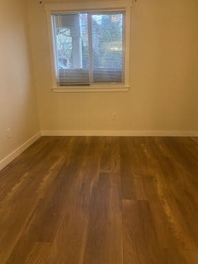 Building Photo - LIKE NEW three bedroom with fantastic updates, one car garage and private newly fenced front patio!