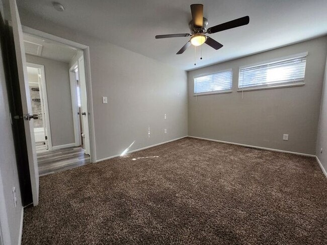 Building Photo - 2-Bedroom Townhome with Fenced Backyard and Modern Updates! |Utilities Included!