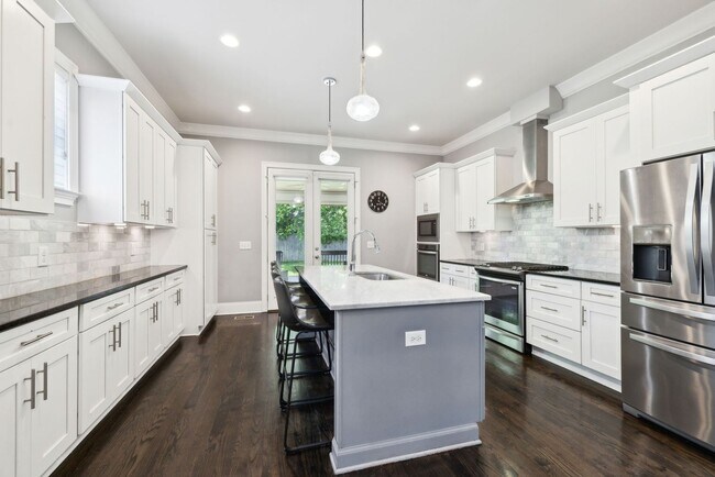 Building Photo - Welcome to this beautifully designed 4-bed...