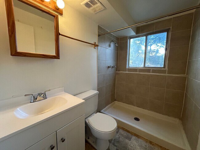 Building Photo - Beautiful Split-Level 6BR Home with Attached Garage and Fenced Yard +$300 Off First Month!