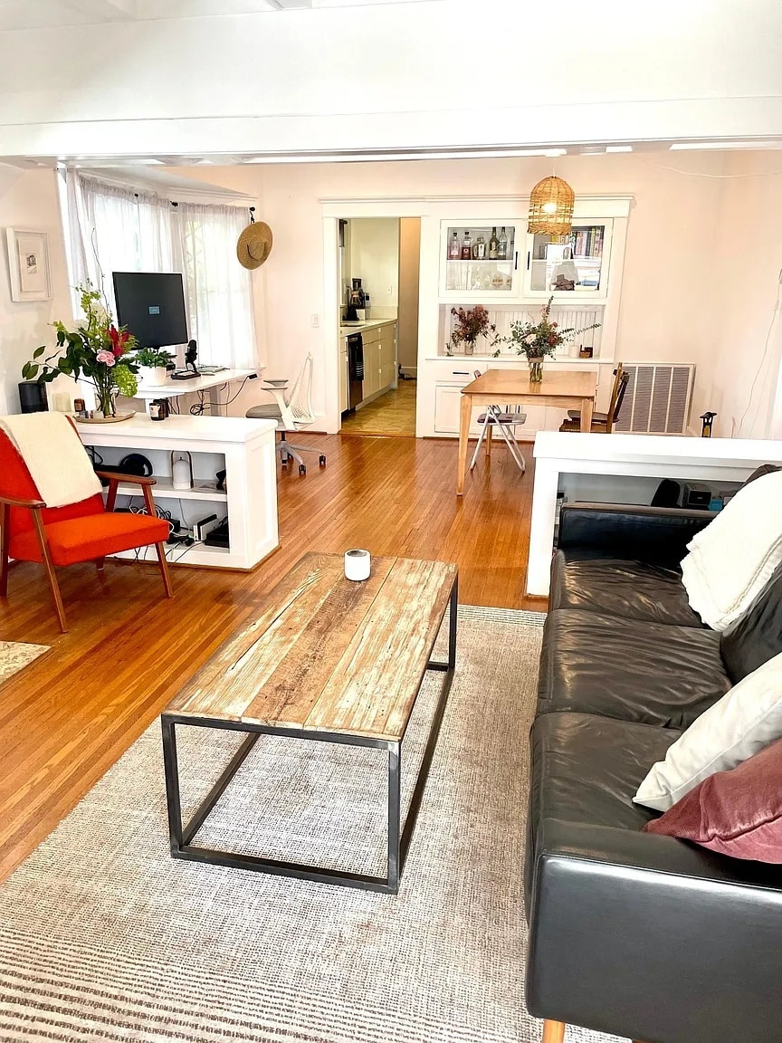 Light-filled dining nook with large bay windows and built-in cabinetry - 6000 Carlton Way
