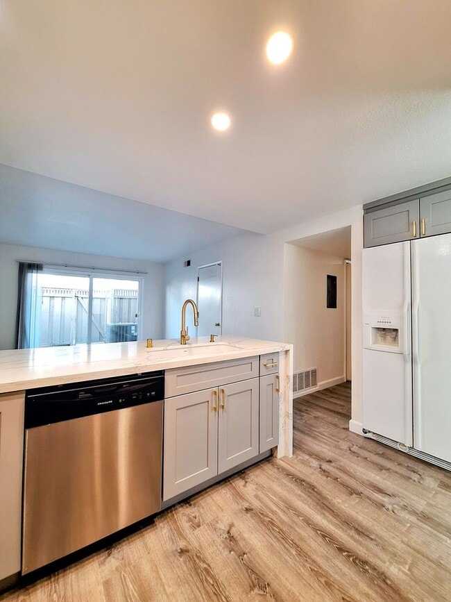 Building Photo - Spacious Two-Story 3bd Townhouse With Private Patios, Balcony, & Garage