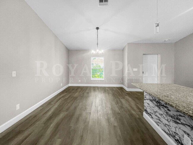 Building Photo - 4BR/2BA Home with High Ceilings, Garage & Large Kitchen Island