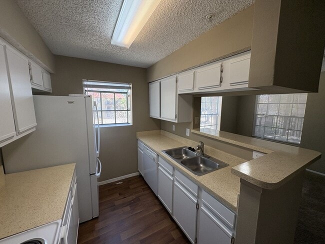 Building Photo - WRAP AROUND PATIO  - LARGE TWO BEDROOM READY NOW!!  $1400 MONTHLY RENT includes water