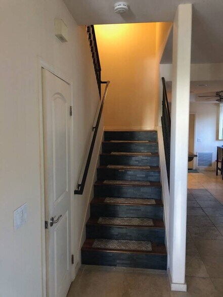 Staircase from 1st fl 1/2 bath to the right of photo - 3958 Lamont St