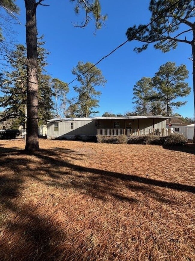 Building Photo - Welcome to this charming 2-bedroom, 1.5-bathroom home located in the desirable area of Leland, NC