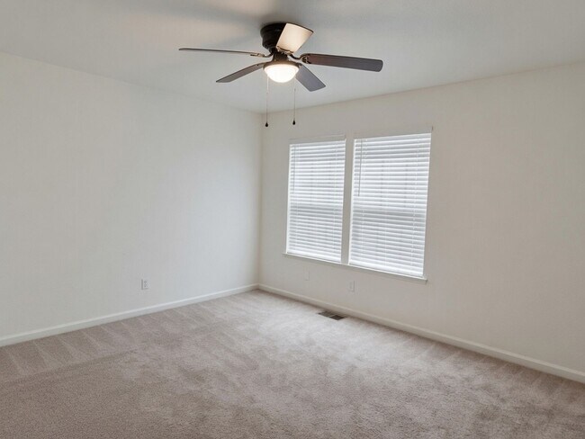 Building Photo - Spacious 4-Bedroom Home with Solar, Finished Garage, Large Pantry & Low-Maintenance Backyard in M...