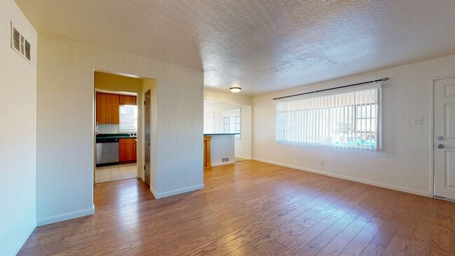 Building Photo - UPTOWN 3 Bedroom +Office  2 Bath with Garage