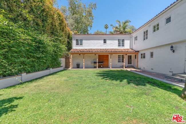 Building Photo - 221 S Beverly Glen Blvd