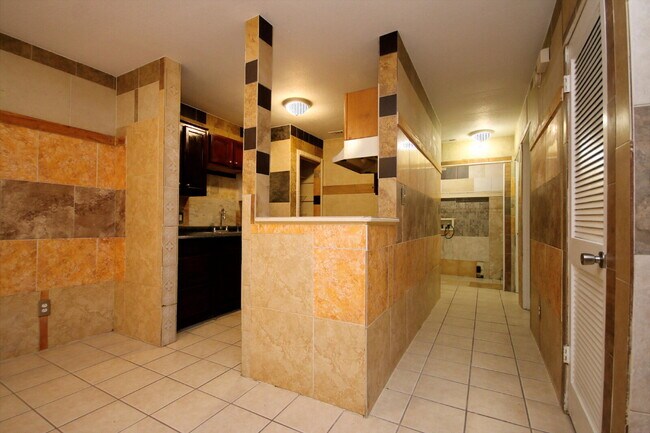 Building Photo - Updated 2BR/1BA Brick Duplex in North Pensacola with Tile Flooring Throughout, Included Utilities...