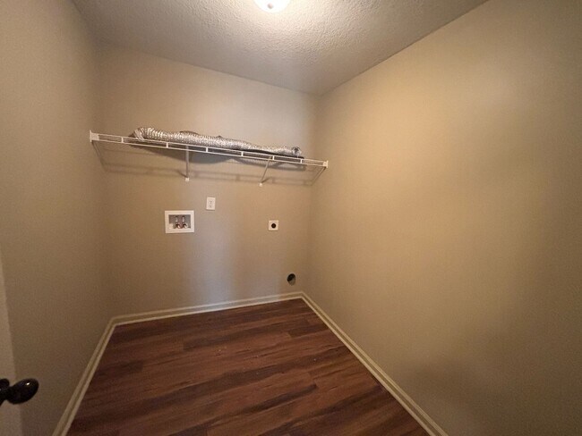 Building Photo - This property blends ample living space and storage with functional amenities.