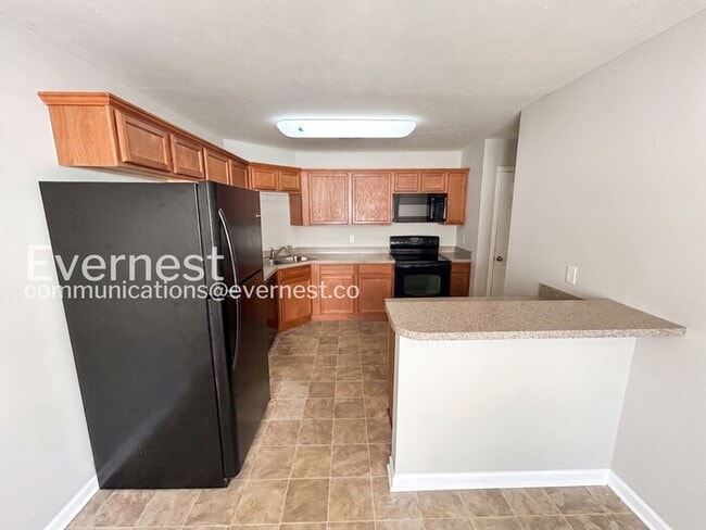 Building Photo - 2 Bed, 2.5 Bath Home with Fenced Yard & Garage / Available Now!