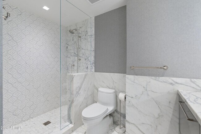 Building Photo - 6587 N Palmeraie Blvd