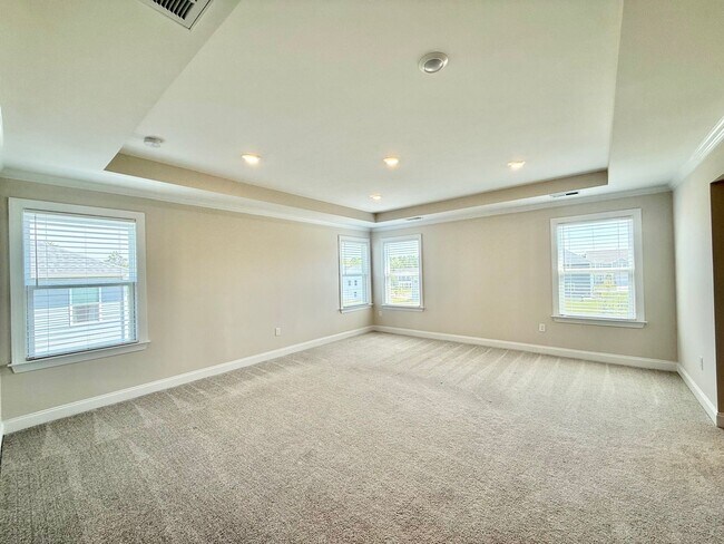 Building Photo - Luxurious 5BD, 4.5BA Holly Springs Home in an HOA Community with Resort-Style Amenities near Down...