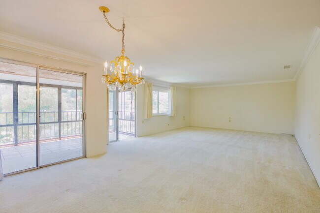 Building Photo - Spacious 3BD/3BA Condo with Enclosed Patio and Resort-style Amenities