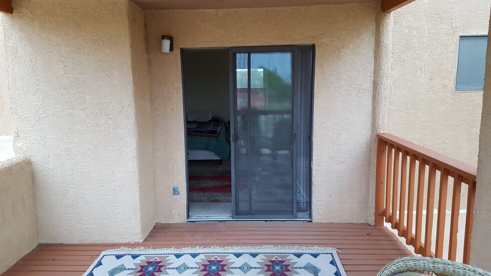 This is the entrance to the deck from the bedroom. - 6436 Saint Josephs Ave NW