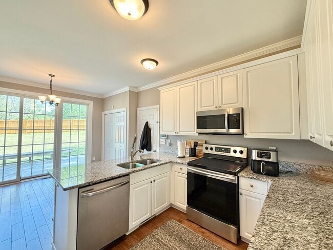 Building Photo - Spacious 3BD, 2.5BA Raleigh Home with First Floor Primary Bedroom & Fenced Yard