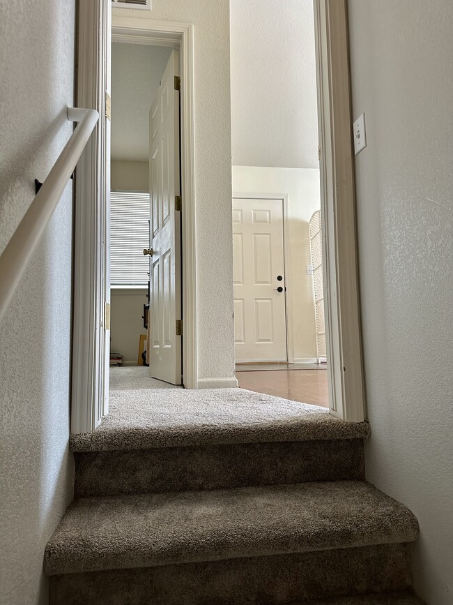 Front entrance door leads straight to basement. Basement door closes for privacy. - 4005 Cotopaxi Dr