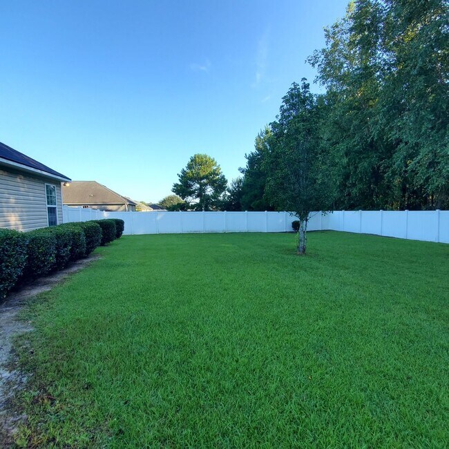 Building Photo - Welcome to Serene Living: Spacious Home on a .61 Acre Lot near Moody Airforce Base