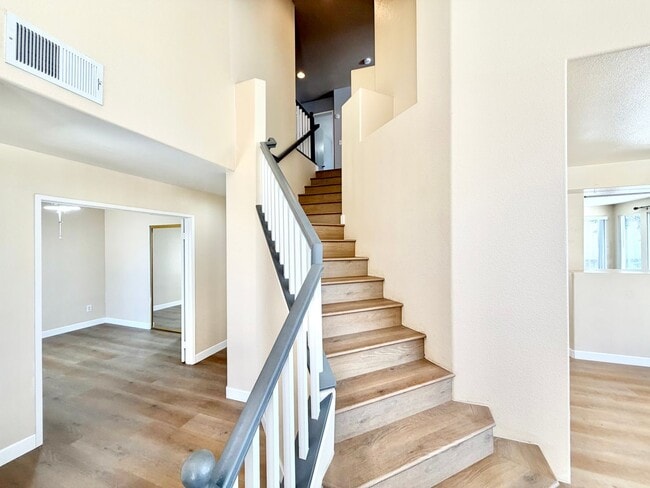 Building Photo - Spacious 5 Bedroom Home with 3 Car Garage & Primary Suite Balcony
