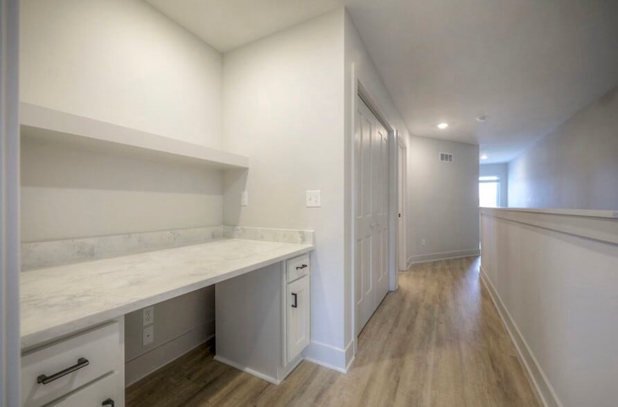 Built-in second-floor workspace with a sleek, integrated design - 22907 W 72nd Ter