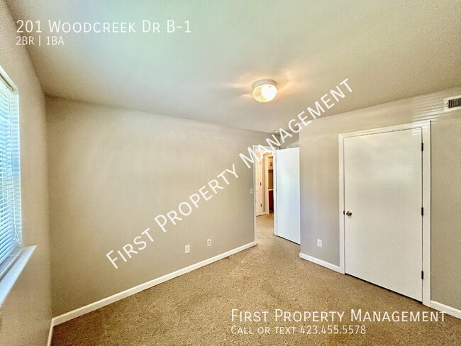 Building Photo - 201 Woodcreek Dr