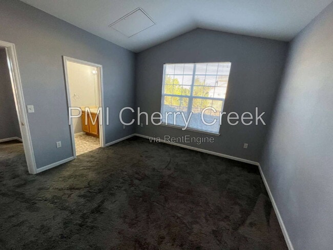 Building Photo - 5705 N Genoa Way