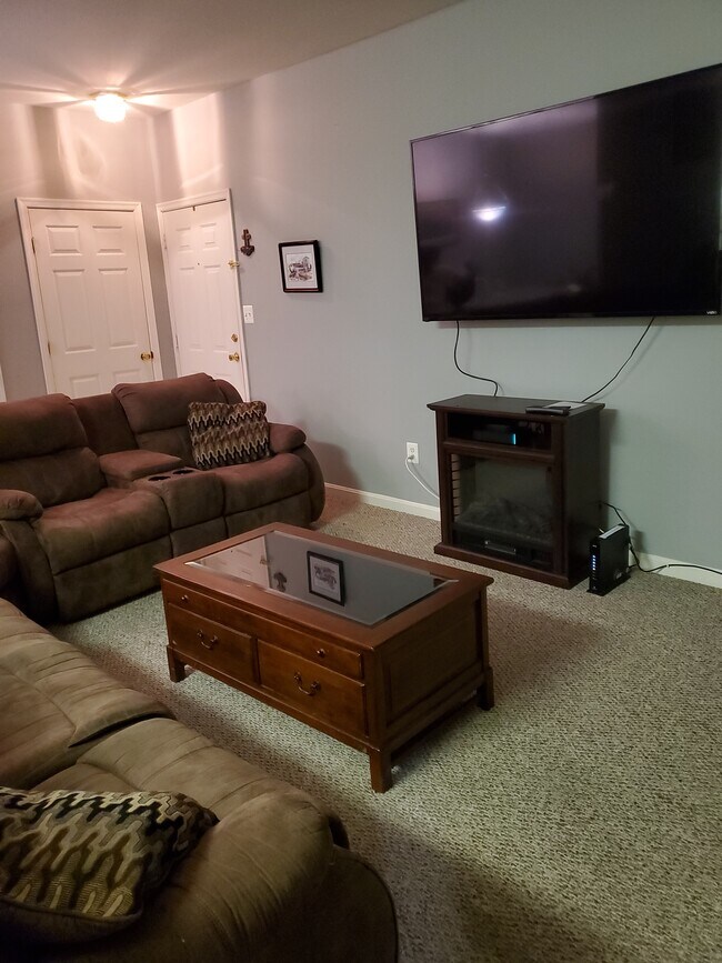 75"TV and plenty of seating - 1974 Scotts Crossing Way