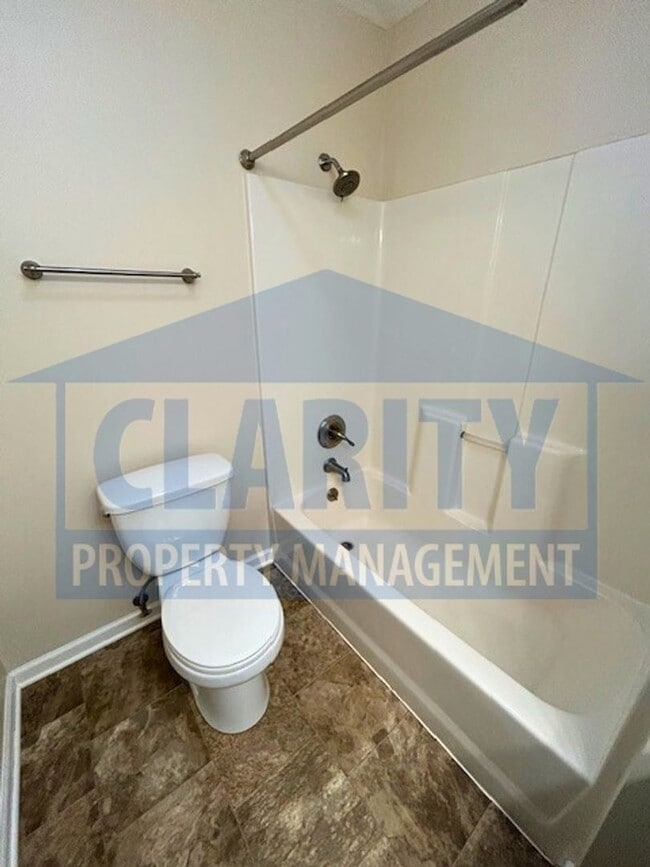 Building Photo - Three bedroom with attached garage!