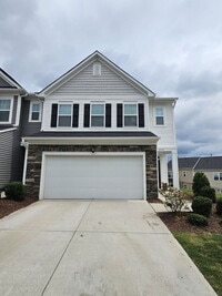Building Photo - Modern townhome with high-end finishes throughout, minutes to 540 and walkable to great shopping.