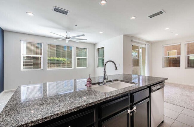 Building Photo - Charming Riverstone Home with Spacious Kitchen Island & Private Backyard