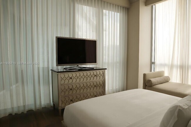 Building Photo - 10295 Collins Ave