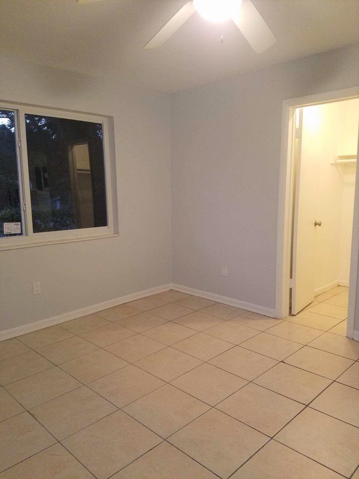 Bedroom 1 with walk-in closet - 1107 N 26th Ave