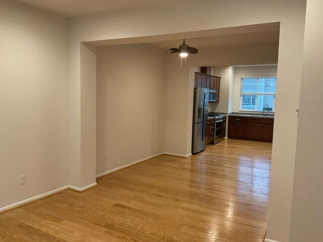 Building Photo - Riverfront Townhome with Tandem Garage & Fenced Yard