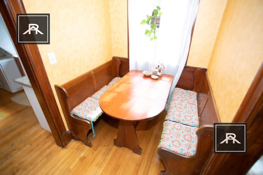 Quaint nook with built cabinets and granite counter - 15 Stetson St