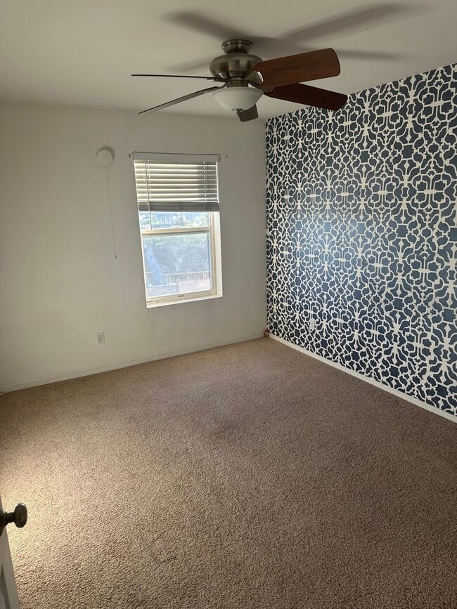 Building Photo - Live in Style and Comfort in this Charming...