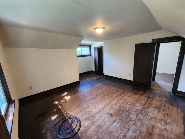 Building Photo - 4 BR home with first-floor living, new roof, and a private-feeling backyard in Lincoln Place