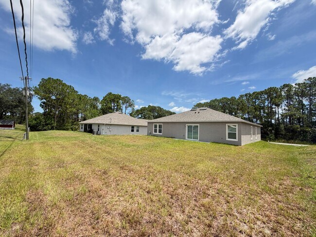Building Photo - Brand-New 4BR Palm Bay Retreat Designed for Modern Living! NEW BUILD HOME!