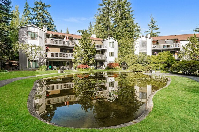 Building Photo - Top-Floor Condo with Forest Views, Large Private Deck & Resort-Style Amenities