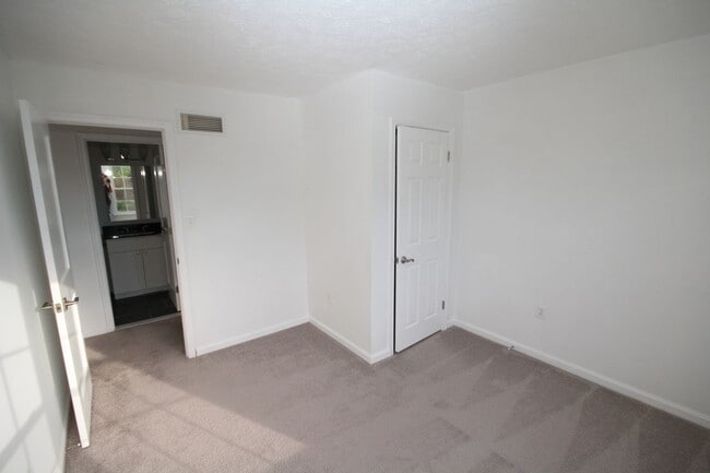 Building Photo - *Coming Soon*  Upgraded End Unit Townhome ...