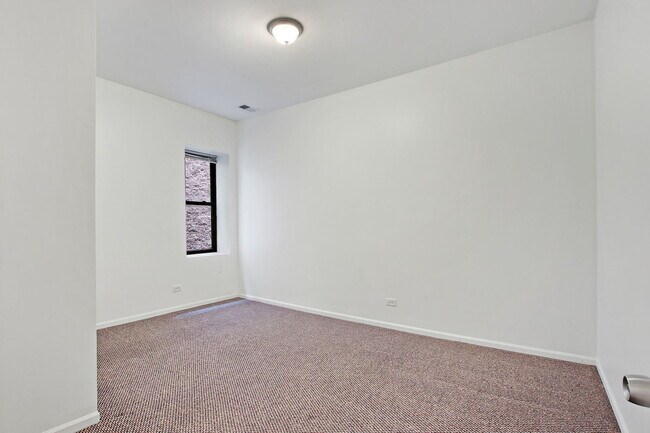 Building Photo - 4527 S St Lawrence Ave