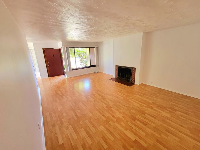 View of LIVING room from bedrooms/bathroom to house entry - 12051 Alberta Dr