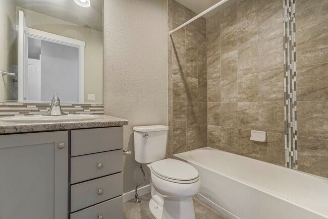 Building Photo - Modern 4BR with Open Kitchen, Patio & 2-Car Garage