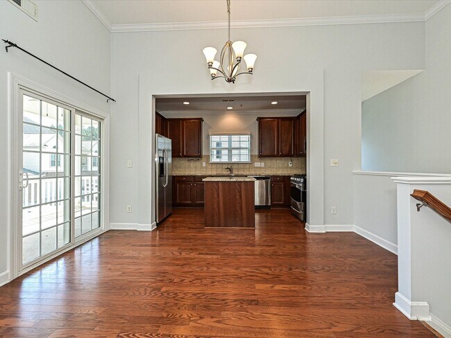 Building Photo - Stylish Condo Living with Open Concept, Garage & Outdoor Space