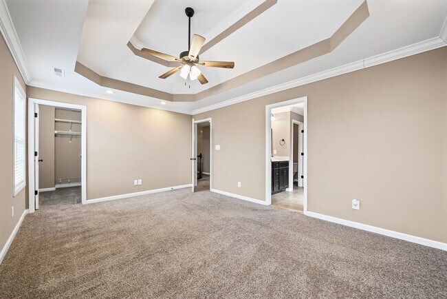 Building Photo - Four Bedroom with Three Car Garage!