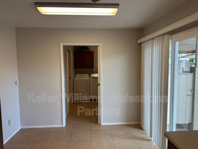 Building Photo - 10621 W Coggins Dr